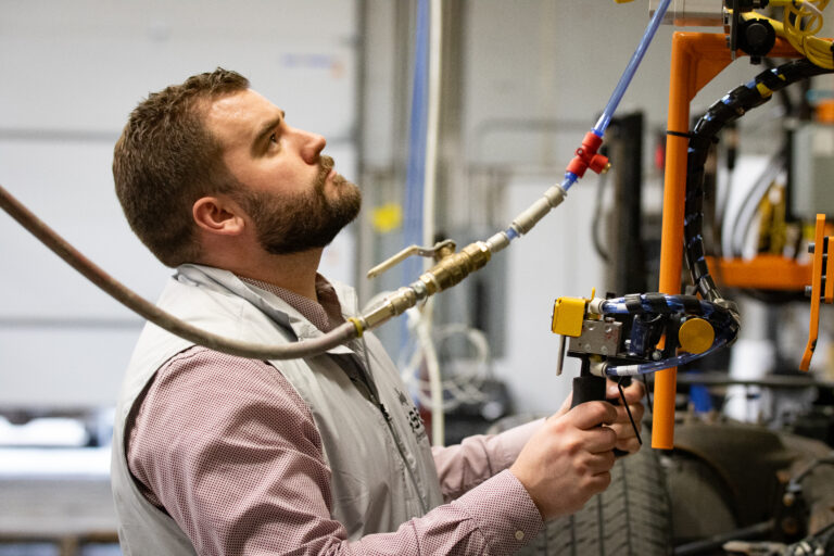 Man using controls to operate machinery